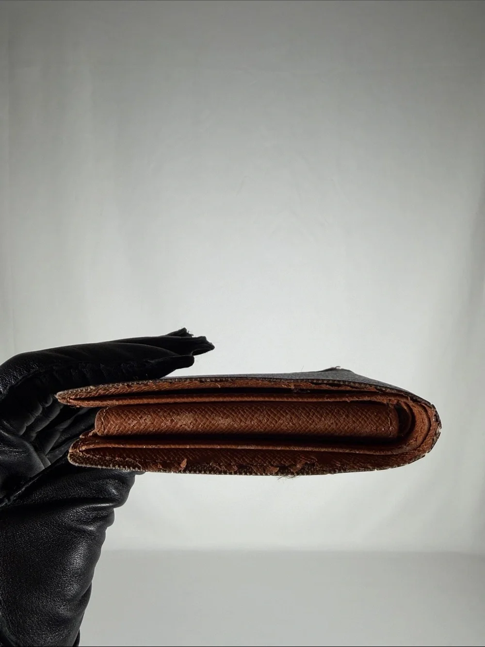 Authentic Louis Vuitton Brown Monogram Men's Bifold Wallet with Gold Accents